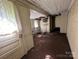 Interior room needing repair, with window showing natural light at 0 Woodleaf Rd, Salisbury, NC 28147