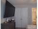 Bedroom featuring modern furnishings, neutral tones, and an en-suite bathroom for added convenience at 1017 W C St, Kannapolis, NC 28081