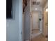 Hallway with carpet, neutral walls, and access to bathroom and rooms, offering a functional layout at 1017 W C St, Kannapolis, NC 28081
