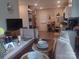 Open-concept living and dining area featuring hardwood floors and a neutral color palette for versatile decorating at 1017 W C St, Kannapolis, NC 28081