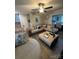 Comfortable living room with a large sectional, ceiling fan, and decor at 1017 W C St, Kannapolis, NC 28081