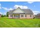 Beautifully maintained backyard featuring a brick house at 116 Postell Dr, Statesville, NC 28625