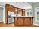 Kitchen showcasing custom wood cabinets, granite countertops and stainless steel appliances at 116 Postell Dr, Statesville, NC 28625