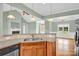 Open kitchen area with granite countertops that flows into the living room at 116 Postell Dr, Statesville, NC 28625