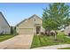 Charming single-Gathering home with a well-maintained lawn and a two-car garage at 125 Rosebay Dr, Mooresville, NC 28117