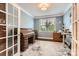 Inviting office with natural light and a vintage roll-top desk, perfect for working from home at 125 Rosebay Dr, Mooresville, NC 28117