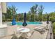 Outdoor community pool with lounge chairs and umbrellas, perfect for relaxation and recreation at 125 Rosebay Dr, Mooresville, NC 28117
