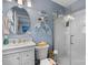 Fresh bathroom with vanity sink, toilet, and glass-enclosed shower stall at 135 Burton Hills Cir, Gastonia, NC 28054