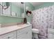 Quaint bathroom with a single sink vanity and decorative shower curtain at 135 Burton Hills Cir, Gastonia, NC 28054