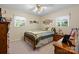 Cozy bedroom with natural light, neutral colors, and comfortable furnishings at 135 Burton Hills Cir, Gastonia, NC 28054
