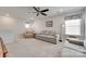 Bonus room with a ceiling fan, comfortable seating, and natural light at 150 Bezelle Ave, York, SC 29745