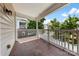 Charming covered balcony with tiled floor, offering a cozy outdoor space at 15209 Loire Valley St, Charlotte, NC 28277