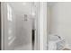 Modern bathroom featuring a glass shower door and a separate soaking tub, perfect for relaxation at 15209 Loire Valley St, Charlotte, NC 28277