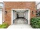 Spacious garage with brick surround and room for parking and storage at 15209 Loire Valley St, Charlotte, NC 28277
