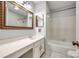 Bathroom with a large mirror over the vanity and a shower/tub combo at 1606 Sharon W Rd # 40, Charlotte, NC 28210