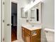 Bathroom vanity, toilet, and fixtures with tiled flooring and an access door at 1606 Sharon W Rd # 40, Charlotte, NC 28210