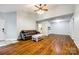 Spacious living room featuring hardwood floors, recessed lighting, and neutral paint at 1606 Sharon W Rd # 40, Charlotte, NC 28210