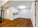 Spacious living room featuring hardwood floors, recessed lighting, and neutral paint at 1606 Sharon W Rd # 40, Charlotte, NC 28210