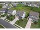 Suburban streetscape featuring manicured lawns and inviting curb appeal in a desirable neighborhood at 17231 Rider Wood Ln, Charlotte, NC 28278