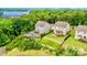 Lake Wylie waterfront homes with backyard pools, decks, and lush landscaping with beautiful lake view at 17231 Rider Wood Ln, Charlotte, NC 28278