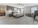 Spacious main bedroom with a neutral palette, accent wall, and seating area at 17231 Rider Wood Ln, Charlotte, NC 28278