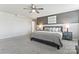 Large main bedroom features a calming color scheme, plush carpeting, and an accent wall at 17231 Rider Wood Ln, Charlotte, NC 28278