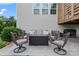 Charming patio with fire pit, comfortable seating, and a cozy outdoor rug at 17231 Rider Wood Ln, Charlotte, NC 28278