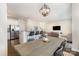 Spacious living area with an open layout showcasing the kitchen, dining, and living room at 1825 Evergreen Dr, Charlotte, NC 28208