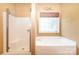 Bathroom featuring a shower stall and soaking tub at 1846 Sam Smith Rd, Fort Mill, SC 29708