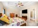 Neutral toned bedroom with ceiling fan and natural lighting at 1846 Sam Smith Rd, Fort Mill, SC 29708