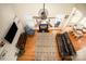 Aerial view of a living room with hardwood floors, a fireplace, and a ceiling fan at 1846 Sam Smith Rd, Fort Mill, SC 29708