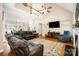 Spacious open-plan living room with hardwood floors and a vaulted ceiling at 1846 Sam Smith Rd, Fort Mill, SC 29708