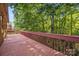 Spacious wood deck overlooking a private, wooded backyard at 212 Foxfield Ln, Matthews, NC 28105