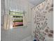 Bathroom featuring floral wallpaper, a window with natural light, and a shower with curtain at 212 Foxfield Ln, Matthews, NC 28105
