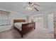 Spacious bedroom boasts vaulted ceilings, plush carpet, and a large window offering ample natural light at 212 Foxfield Ln, Matthews, NC 28105