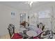 Cozy dining area features a round glass table with ornate chairs, bathed in natural light from the adjacent window at 212 Foxfield Ln, Matthews, NC 28105