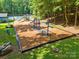 Bright, colorful playground with slides, swings, and a wood chip ground cover nestled in a green area at 212 Foxfield Ln, Matthews, NC 28105