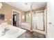 Bathroom featuring double sinks, soaking tub, and a separate shower at 2240 Arbor Vista Dr, Charlotte, NC 28262