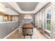 Elegant dining room with a modern light fixture, hardwood floors, and lots of natural light at 2240 Arbor Vista Dr, Charlotte, NC 28262