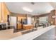 Functional kitchen featuring wood cabinets, a breakfast nook, and stainless steel appliances at 2240 Arbor Vista Dr, Charlotte, NC 28262