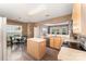 Functional kitchen featuring wood cabinets, a breakfast nook, stainless steel appliances, and hardwood floors at 2240 Arbor Vista Dr, Charlotte, NC 28262