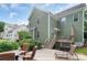 Spacious backyard deck, perfect for outdoor entertaining and relaxation with steps down to lawn at 2619 Merion Hills Ct, Charlotte, NC 28269