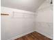 Walk in closet with wire shelving and wood floors at 2619 Merion Hills Ct, Charlotte, NC 28269