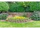 Chatham neighborhood sign featuring stone and beautiful flowerbeds near a manicured lawn at 2619 Merion Hills Ct, Charlotte, NC 28269