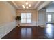 Formal dining room area features a trey ceiling, hardwood floors, and crown molding at 3009 Palm Dr, Fort Mill, SC 29715