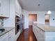 This gourmet kitchen is equipped with stainless steel appliances and granite countertops at 3009 Palm Dr, Fort Mill, SC 29715