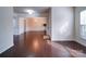 Open-concept living room showcasing hardwood floors and abundant natural light at 3009 Palm Dr, Fort Mill, SC 29715