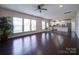 Open-concept living area with modern finishes, hardwood floors, and an adjacent kitchen at 3009 Palm Dr, Fort Mill, SC 29715