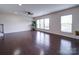 Large living room with hardwood floors and ample natural light at 3009 Palm Dr, Fort Mill, SC 29715