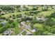 Aerial shot of real estate featuring green spaces, mature trees, and well-maintained lawns at 3222 Player Ct, Salisbury, NC 28144